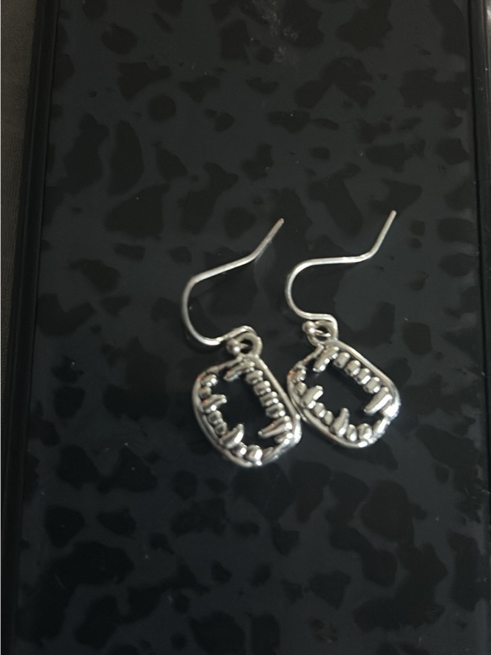 Silver Tone Dangle Earrings with Textured Oval Charms